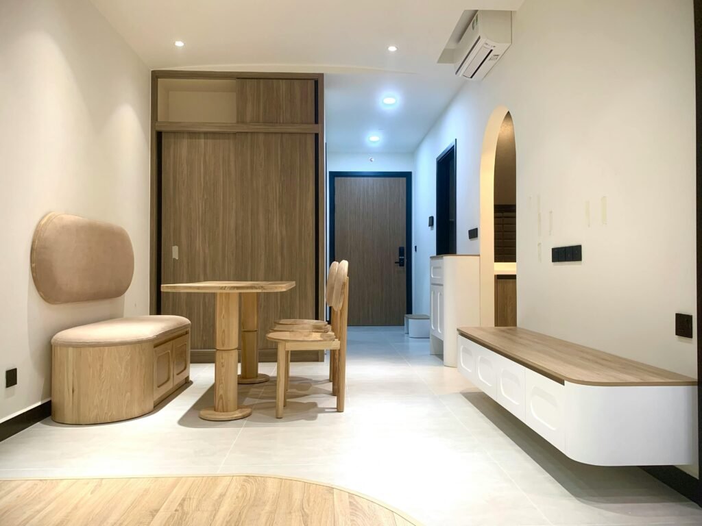 Bright modern living room featuring wooden furniture and sleek interior design.